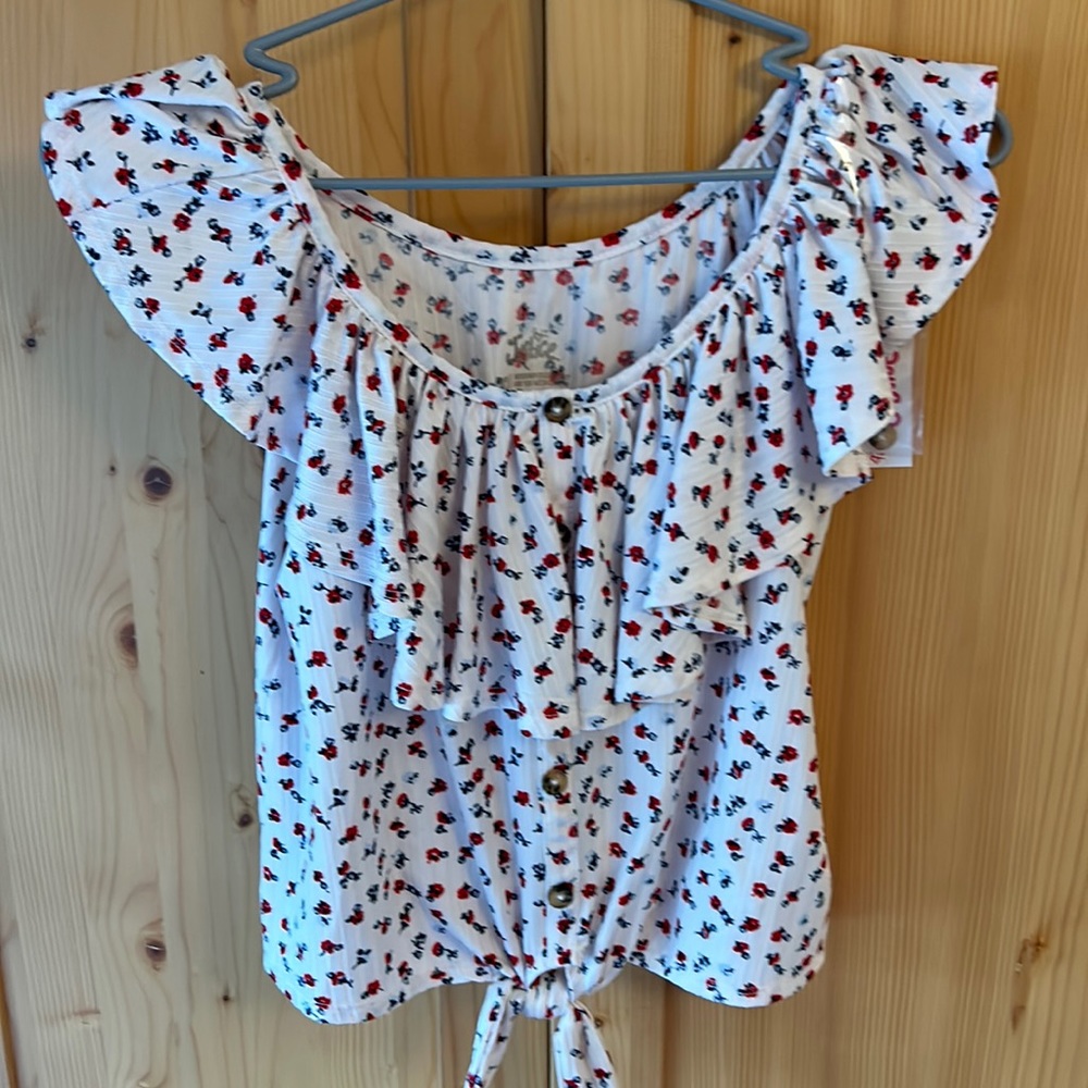 Justice ruffle blouse. Size girls 12. New with tags, never worn.